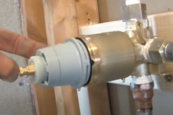 Install the shower faucet cartridge