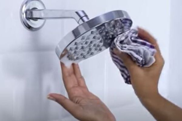 clean the clogged rain shower head