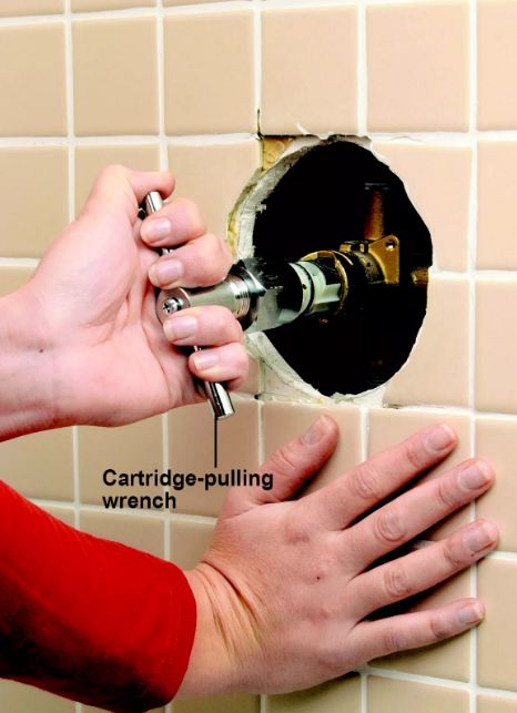 using a cartridge pulling wrench 