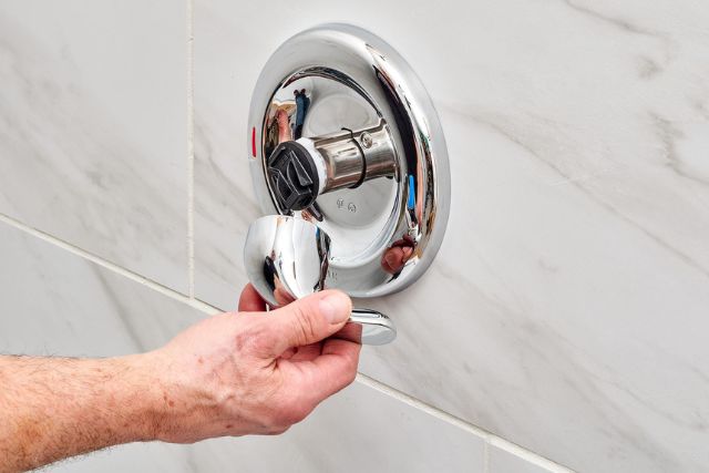 how to remove moen shower handle without screws