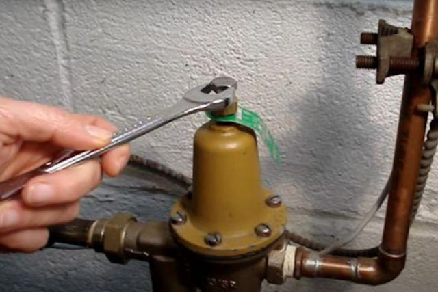 adjusting bolt and turn it clockwise to increase the pressure