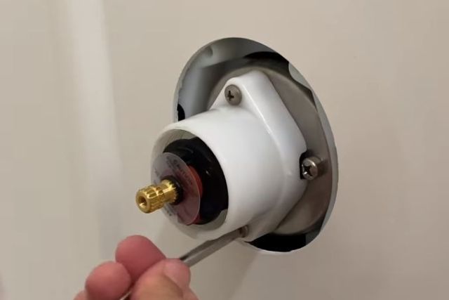  reassemble the shower valve