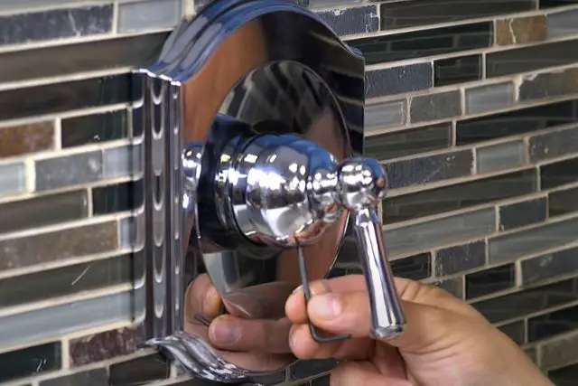 remove the faucet handle use an allen wrench